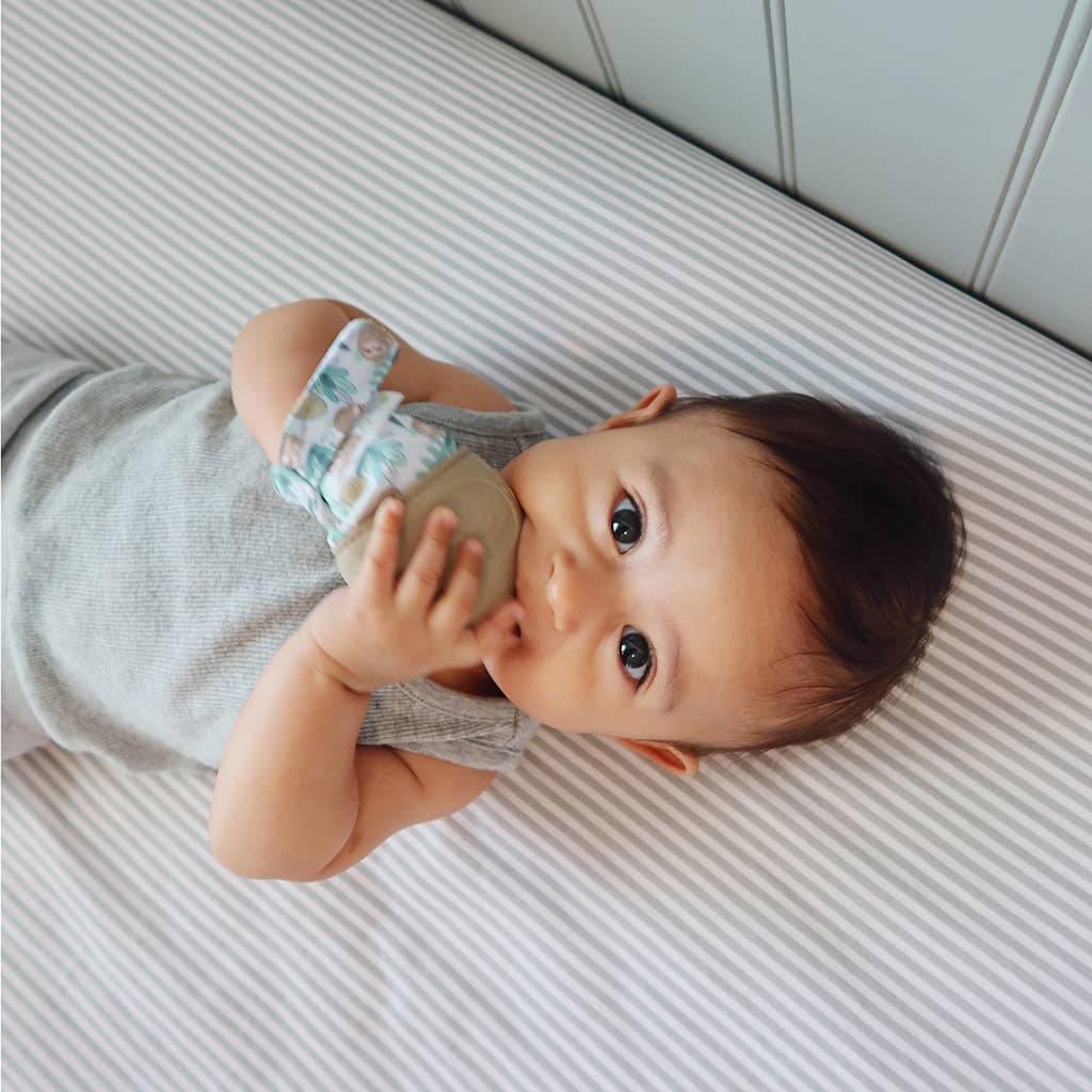 Itzy Mitt™ Silicone Teething Mitts: Dinosaur - Premium teethers from Itzy Ritzy - Just $9.95! Shop now at Pat's Monograms