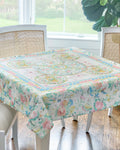 Tablecloth with floral and butterfly design on a dining table