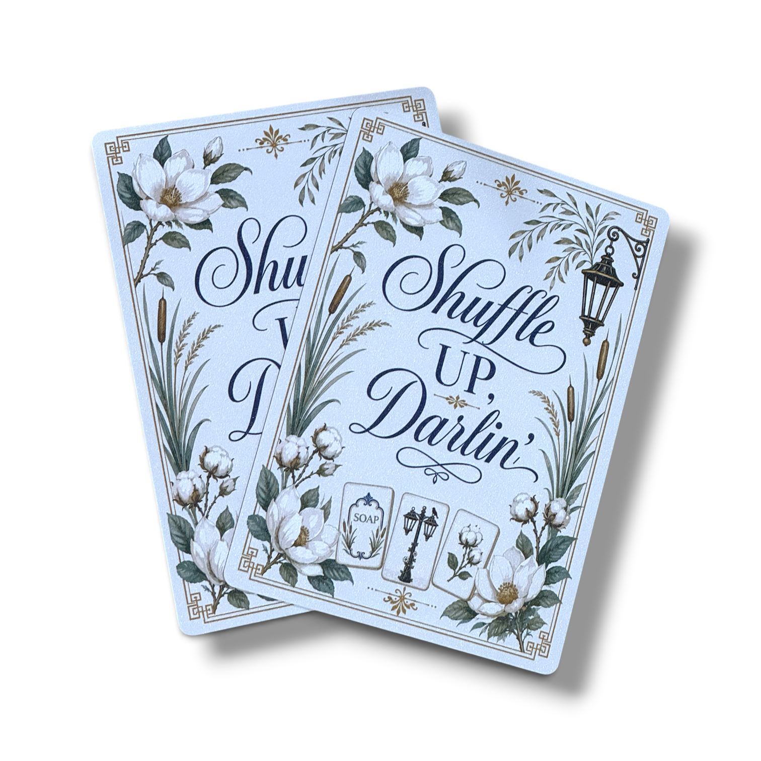 Shuffle Up, Darlin' mahjong shufflers, set of two, in navy and cream with magnolia, cotton boll, river reed, and Southern lantern artwork by Told in Tiles
