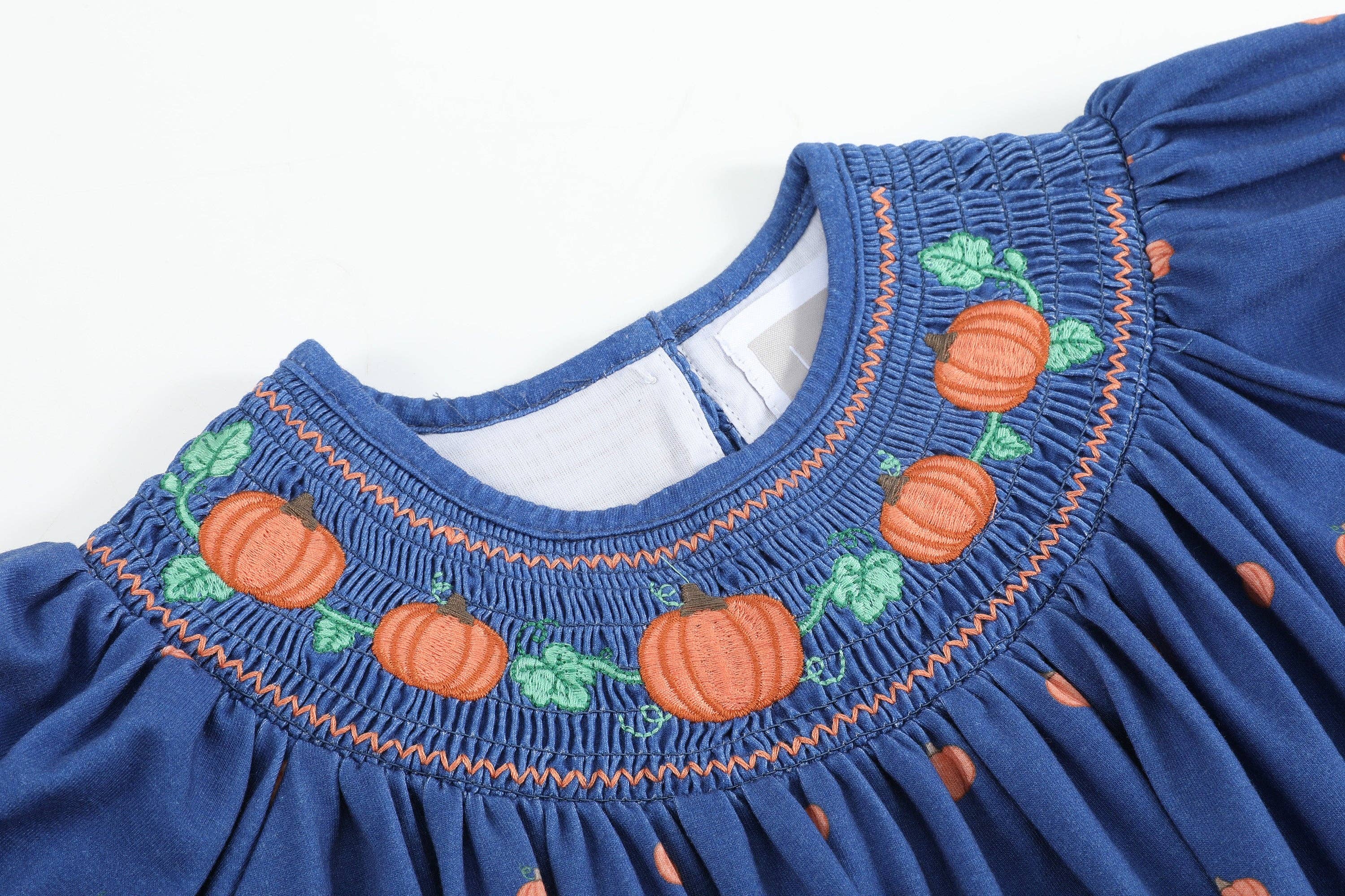 Blue Pumpkin Print Knit Smocked Bishop Dress - Premium  from Lil Cactus - Just $38! Shop now at Pat's Monograms