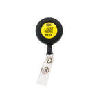 Say What Badge Reels — About Face badge reel