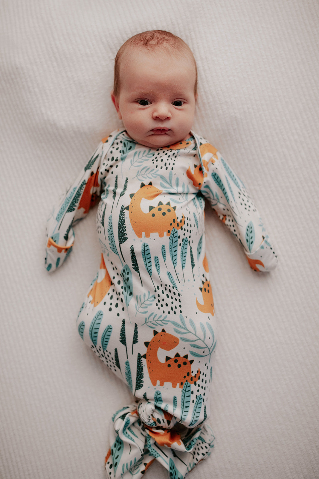 Dinosaur Knotted Baby Gown and Knot Cap - Premium Just for baby from Three Little Tots - Just $24.95! Shop now at Pat's Monograms